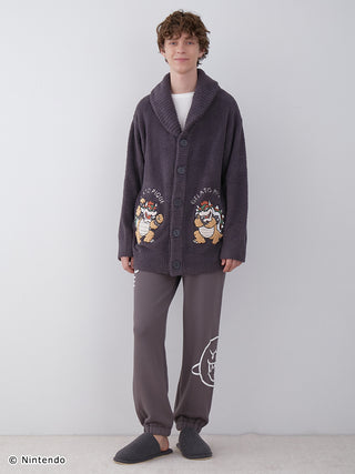 Model wearing Super Mario unisex Baby Moco Jacquard Shawl Cardigan, featuring soft, fluffy fabric and iconic character designs.