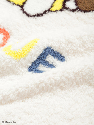 Close-up of Dick Bruna Babymoco Motif JQD Blanket showing colorful stitched characters on soft white fabric.