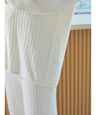 Close-up of the white Thermal Smoothie Pullover Sweater displaying its ribbed texture and smooth fabric for elegant loungewear.
