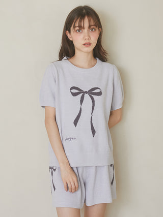 Woman wearing Gelato Pique USA Ribbon Jacquard Lounge Shorts and top, featuring a premium loungewear ribbon design, soft touch fabric.