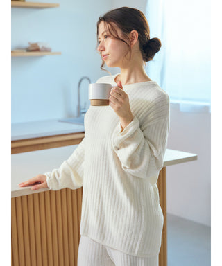 Woman wearing Thermal Smoothie Pullover Sweater in kitchen, holding cup, showcasing ribbed texture and cozy loungewear style.