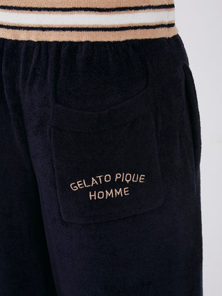 Close-up of Smooth Light Loungewear Shorts showcasing chic embroidery and sporty waistline.