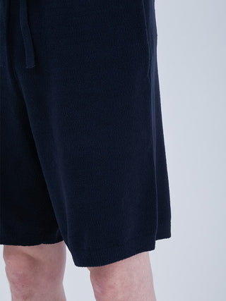 Close-up view of Airmoco ultra comfy men's lounge shorts in black with jacquard pattern, featuring a casual and stylish design.