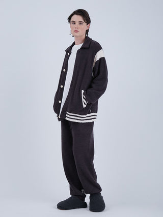 Model wearing Baby Moco Men's Long Lounge Pants with matching jacket in luxurious 'Babymoco' material by Gelato Pique HOMME.