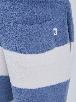 Close-up of Baby Moco Men's Long Lounge Pants in blue and white stripes, featuring a soft texture and pocket detail for comfort.