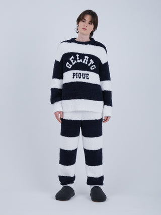 Model wearing navy and white striped fluffy pajama set with text 'Gelato Pique', featuring ribbed hems and eco-friendly fabric.
