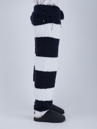 Sustainable double striped men's fluffy pajama pants with ribbed hem and eco-friendly design, shown from side profile.