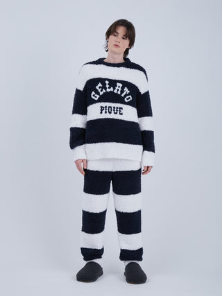Model wearing Sustainable Recycled Gelato Double Striped Pullover Sweater and pants, featuring eco-friendly recycled fabric.