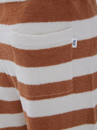 Close-up of brown and white striped Smoothie Logo Men's shorts with pocket, showcasing soft material and loungewear design.