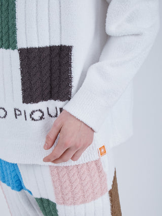EAMES Air Moco Logo Men's Knit Pullover in white with jacquard design, featuring colorful blocks and texture, crafted from recycled polyester.