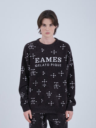 Model wearing EAMES Mens Smoothie Jacquard Pullover Sweatshirt with dot pattern, mid-century style, made from recycled materials.