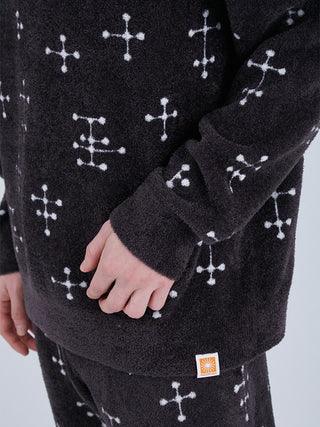 Close-up of EAMES MENS Smoothie Jacquard Sweatshirt with mid-century dot pattern, made from recycled polyester, showcasing elegant design.
