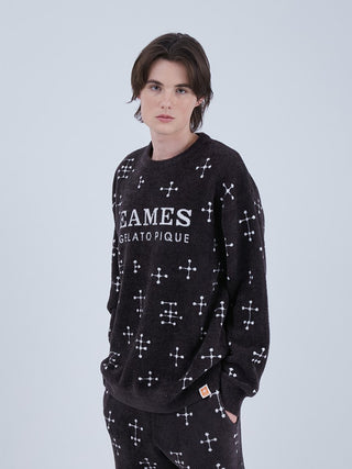 Model in EAMES MENS Smoothie Jacquard Pullover Sweatshirt featuring dot pattern, mid-century style, and recycled material.
