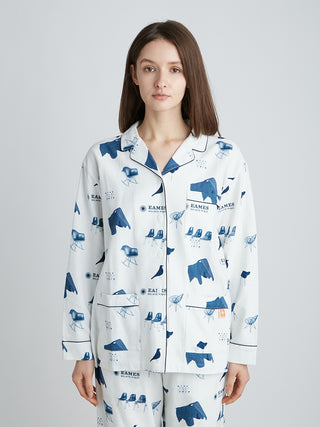 Woman wearing EAMES Chair Motif women's sleepwear shirt with mid-century print and piping, part of GELATO PIQUE collaboration.