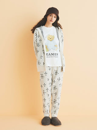 Woman wearing EAMES Smoothie Women's Zip Up Hoodie with mid-century dot pattern, loungewear ensemble for cozy days.