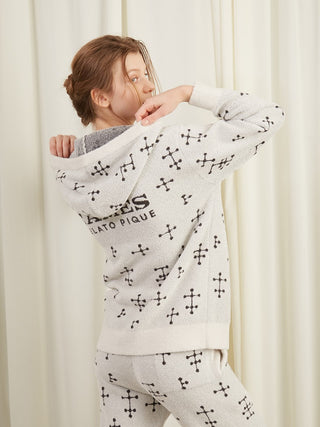 Woman wearing EAMES Smoothie Women's Zip Up Hoodie with dot pattern, showcasing mid-century modern style loungewear.