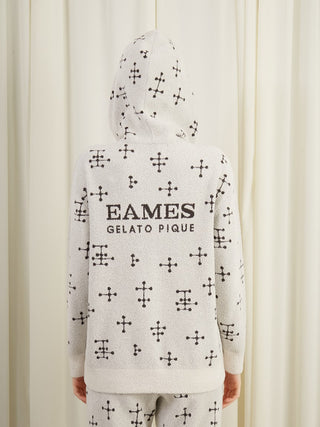 Back view of EAMES Smoothie Women's Zip Up Hoodie featuring mid-century dot pattern and logo. Cozy loungewear design in soft fabric.