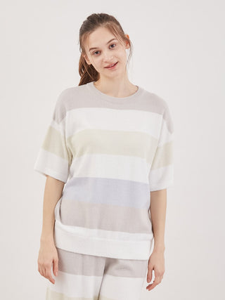 Model wearing Smoothie Family Border Short-Sleeved Pullover in pastel stripes by Gelato Pique, cozy loungewear fashion.