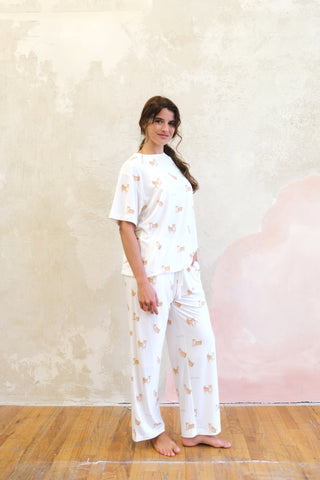 Woman wearing white Shiba Motif Lounge T-shirt and pants set from Gelato Pique USA, featuring premium loungewear and sleepwear.