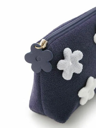 Navy Airy Moco Flower Pouch by Gelato Pique with plush white flower appliqués, perfect for storing essentials.