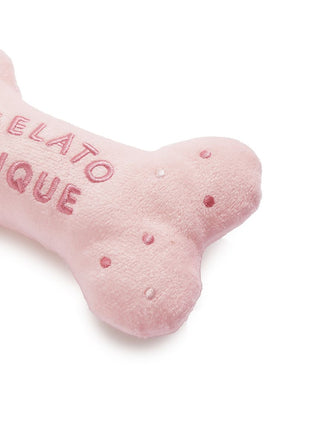 Bone-shaped plush pet toy for cats and dogs, soft pink with decorative text. Ideal for pet play and comfort. Non-returnable item.