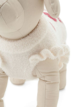 Close-up of Cherry Jacquard pet clothes for cats and dogs, featuring a soft ruffled edge on a plush material.