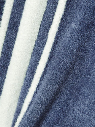 Close-up of Gelato Pique Smoothie fabric in blue and white, showcasing the soft, velvety texture of the Durable Smoothie Cardigan.