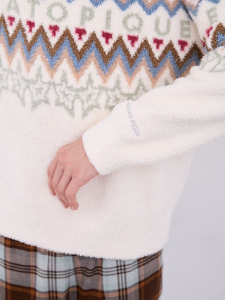 Close-up of a Gelato Pique Powder Fair Isle Jacquard sweater, showcasing the intricate pattern and soft texture.