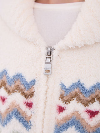 Close-up of Powder Shawl Collar Cardigan with Fair Isle-inspired pattern, featuring cozy textures and a stylish full-zip front.