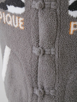 Close-up of the gray Powder Panda Jacquard Varsity Jacket highlighting cozy texture and unique Chinese button detail by Gelato Pique USA.