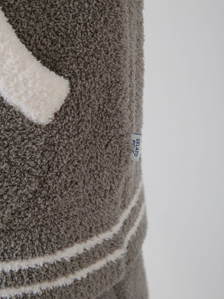 Close-up of Gelato Pique USA gray panda jacquard varsity jacket showing cozy, premium loungewear soft texture.