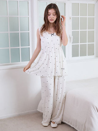 White heart-print pajama set with sleeveless top and wide-leg pants.