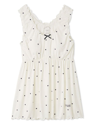 Gelato Pique women’s white sleeveless babydoll pajama top featuring black heart pattern, ruffled edges, ribbon bow at neckline, and embroidered logo.