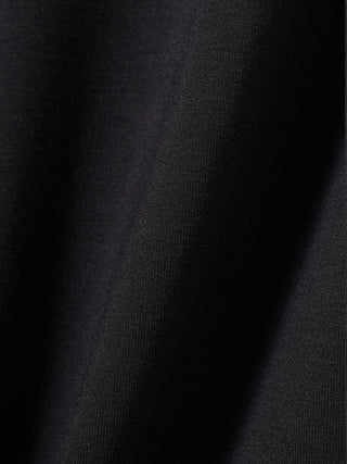 Close-up of black rayon fabric showing texture and softness.
