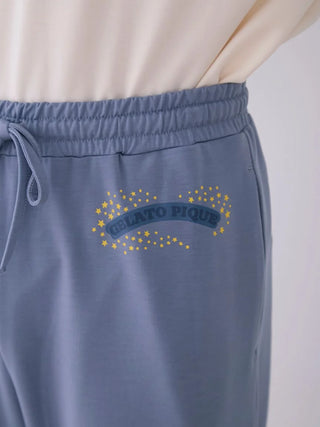 Men's lounge pants with star pattern and Gelato Pique logo on waistband, soft and breathable for lounging or sleep.