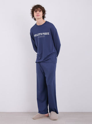 Model wearing Men's Rayon Inlay Message Logo Lounge Pants by Gelato Pique, featuring a relaxed fit and soft rayon fabric.