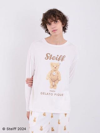 Man wearing Steiff Men's James Long Sleeve Top with teddy bear motif in soft ivory color.