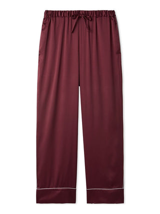 Men's burgundy satin pajama pants with white piping, luxurious and comfortable sleepwear for restful nights.