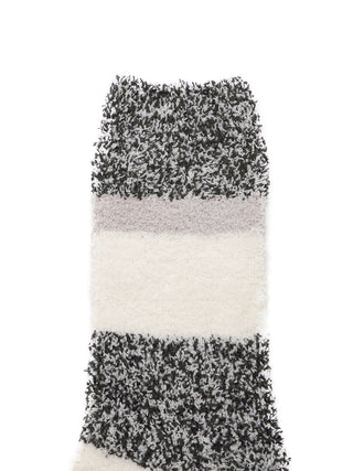 Close-up of Powder Melange Striped Fuzzy Socks with black and white textured stripes for cozy lounging.