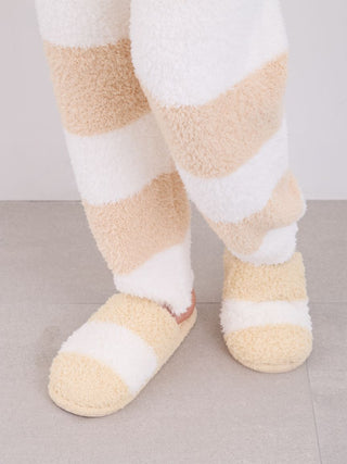 Cozy beige and white Gelato Border House Slippers with striped design, perfect for comfort and style.