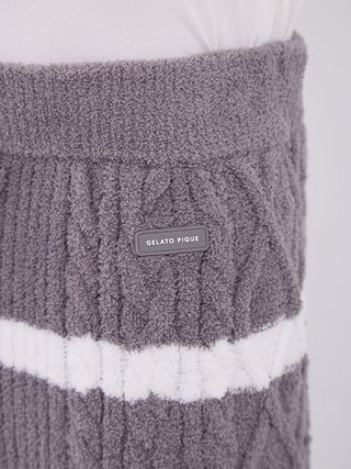 Close-up of Baby Moco Aran striped cable knit pajama pants in gray with soft white accents, featuring cozy texture and Gelato Pique label.