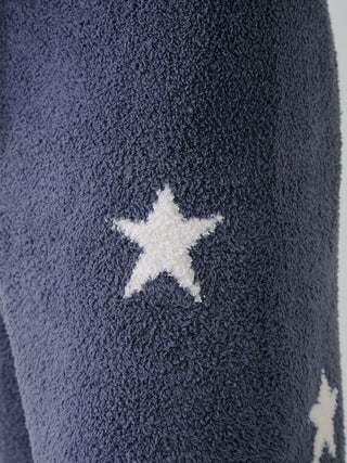 Close-up of navy Gelato Pique USA Powder Star Jacquard Lounge Pants with star pattern, premium loungewear and sleepwear.