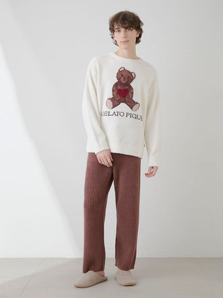 Model wearing Gelato Pique's Babymoco Bear Motif Ribbed Lounge Pants for men in a relaxed setting.