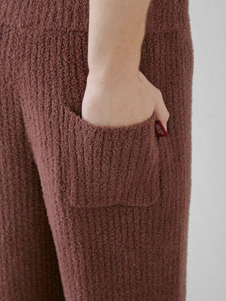 Close-up of brown ribbed lounge pants featuring a cozy pocket, made of soft Babymoco fabric from Gelato Pique USA.