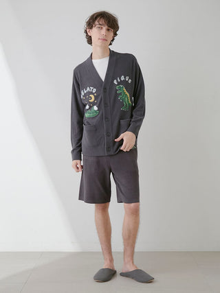 Man wearing Gelato Pique USA Air Moco Dinosaur Jacquard Lounge Shorts, showcasing premium loungewear with a playful dinosaur design.