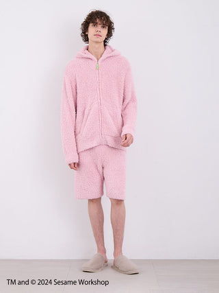 Men's Elmo hoodie and shorts loungewear set in pink, featuring fluffy fabric for comfort and nostalgia, from Sesame Street collection.