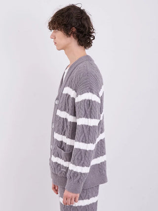 Man wearing gray and white striped Aran cable knit cardigan from Gelato Pique's Baby Moco collection.