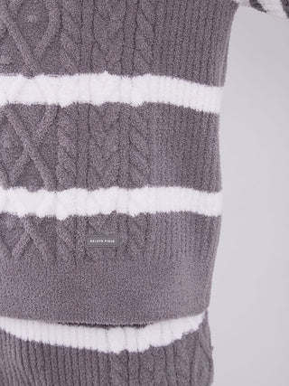 Close-up of gray and white Baby Moco Aran Border Pullover Sweater by Gelato Pique, featuring cable knit pattern and horizontal stripes.