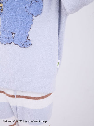 Close-up of Sesame Street men's motif pullover and lounge pants set in soft Baby Moco fabric, featuring original artwork design.