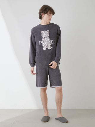 Model wearing Gelato Pique USA Men's White Tiger Pullover and Lounge Shorts Set with tiger design, combining style and comfort.